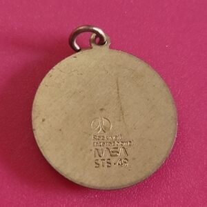 Rockwell International NASA Gold Pendant